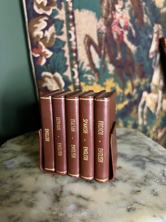Set of 5 gilt page dictionaries